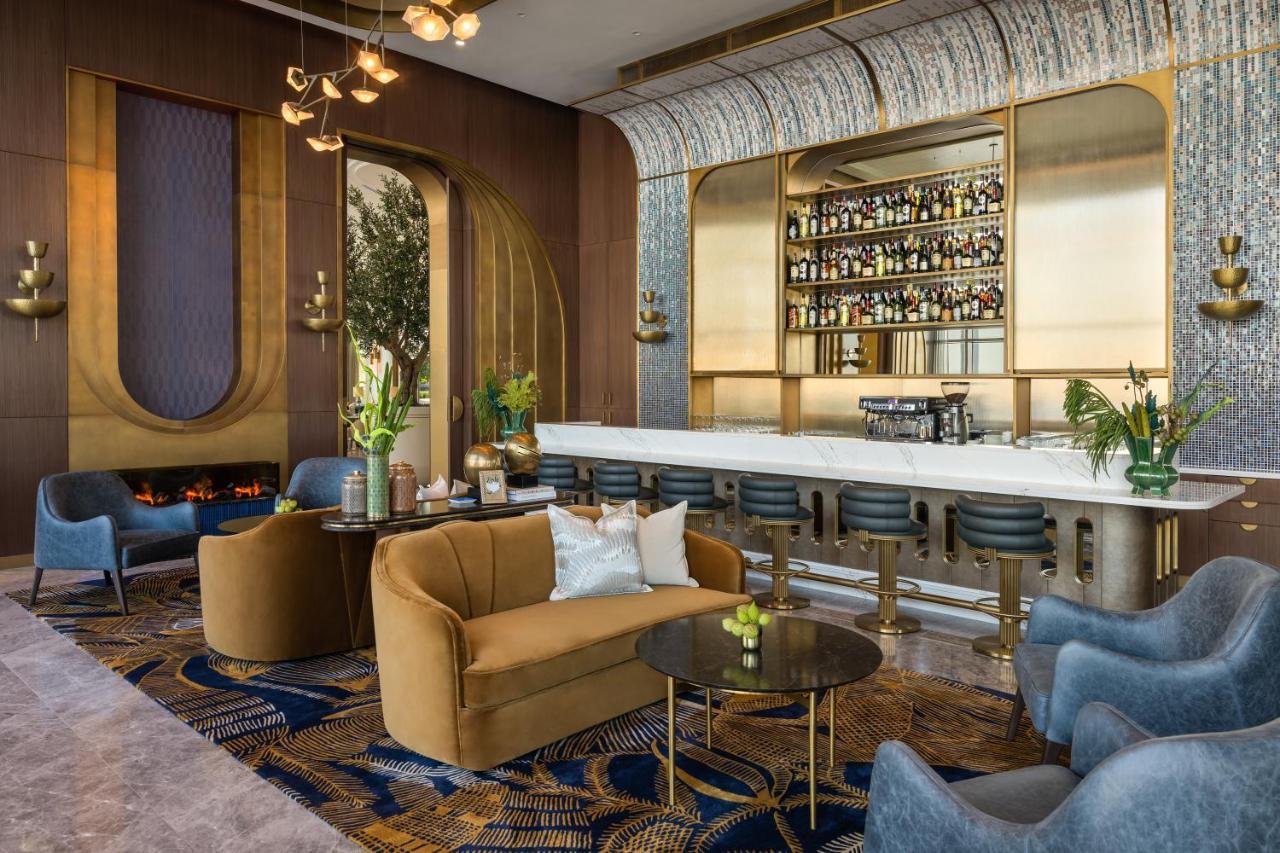 Hotel Address Creek Harbour Dubái Exterior foto The Bar at The St. Regis