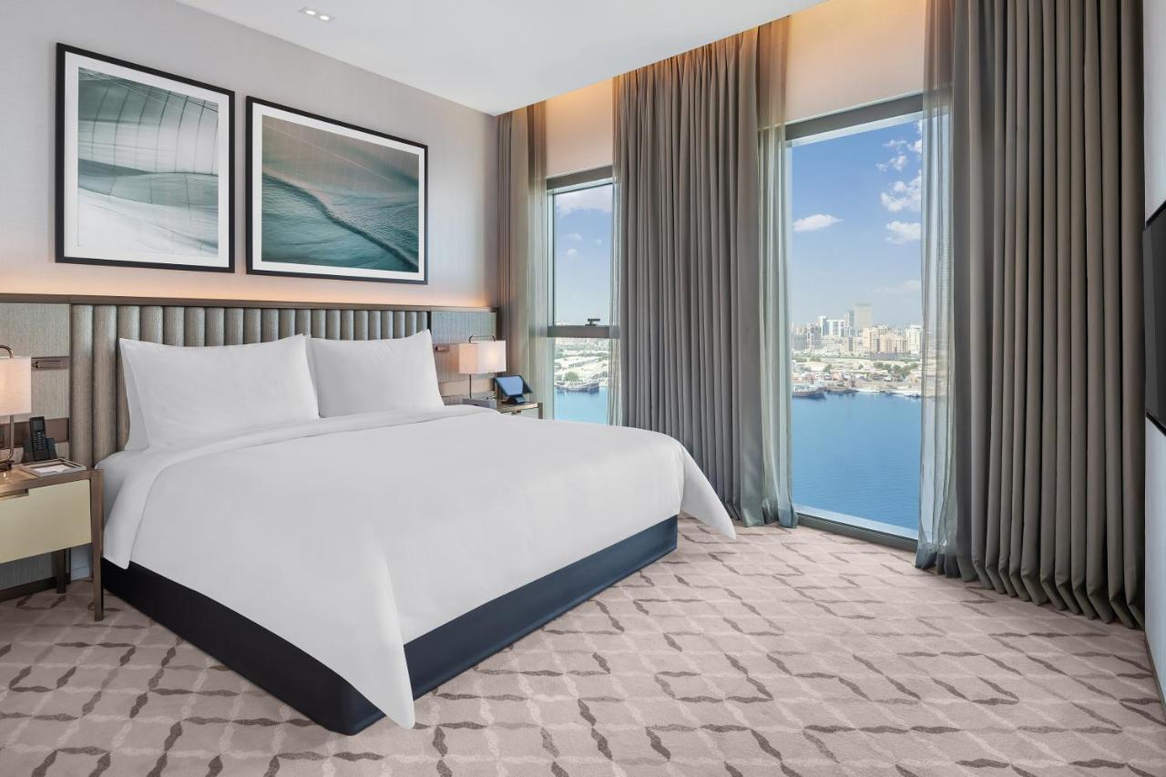 Hotel Address Creek Harbour Dubái Exterior foto A bedroom at the hotel