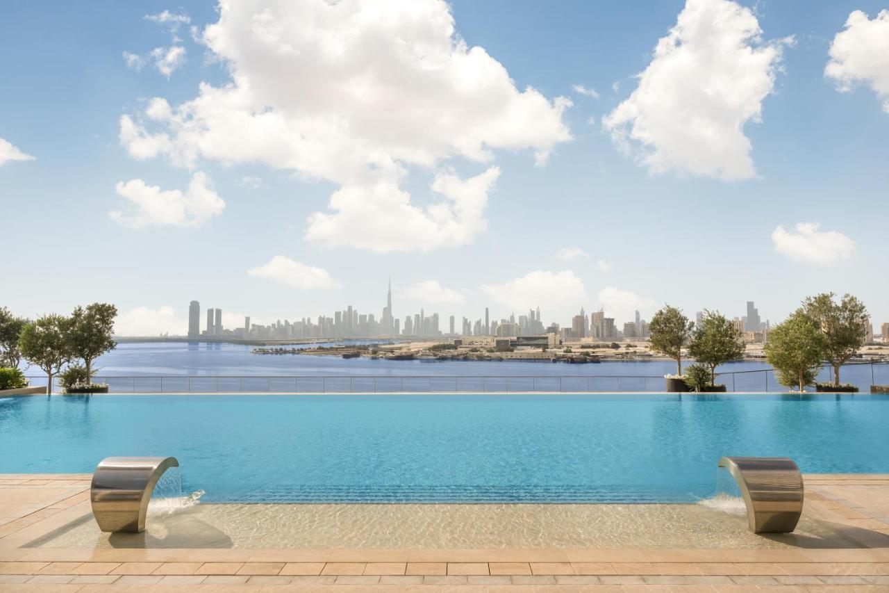 Hotel Address Creek Harbour Dubái Exterior foto View of Dubai from the pool