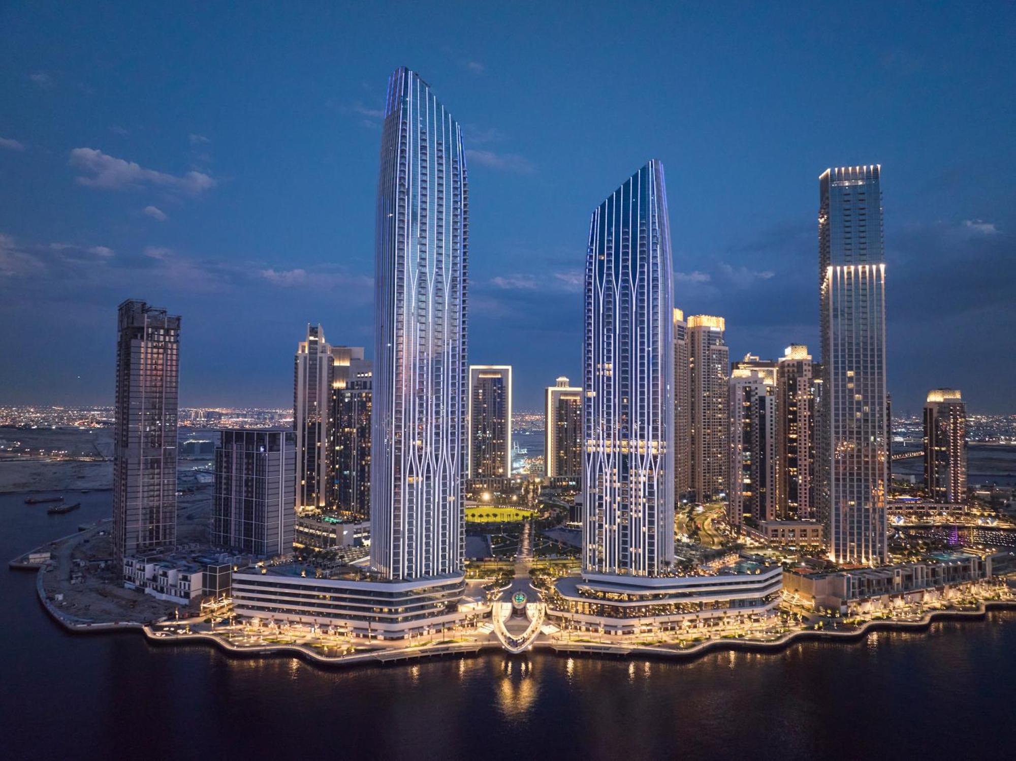 Hotel Address Creek Harbour Dubái Exterior foto The complex at night