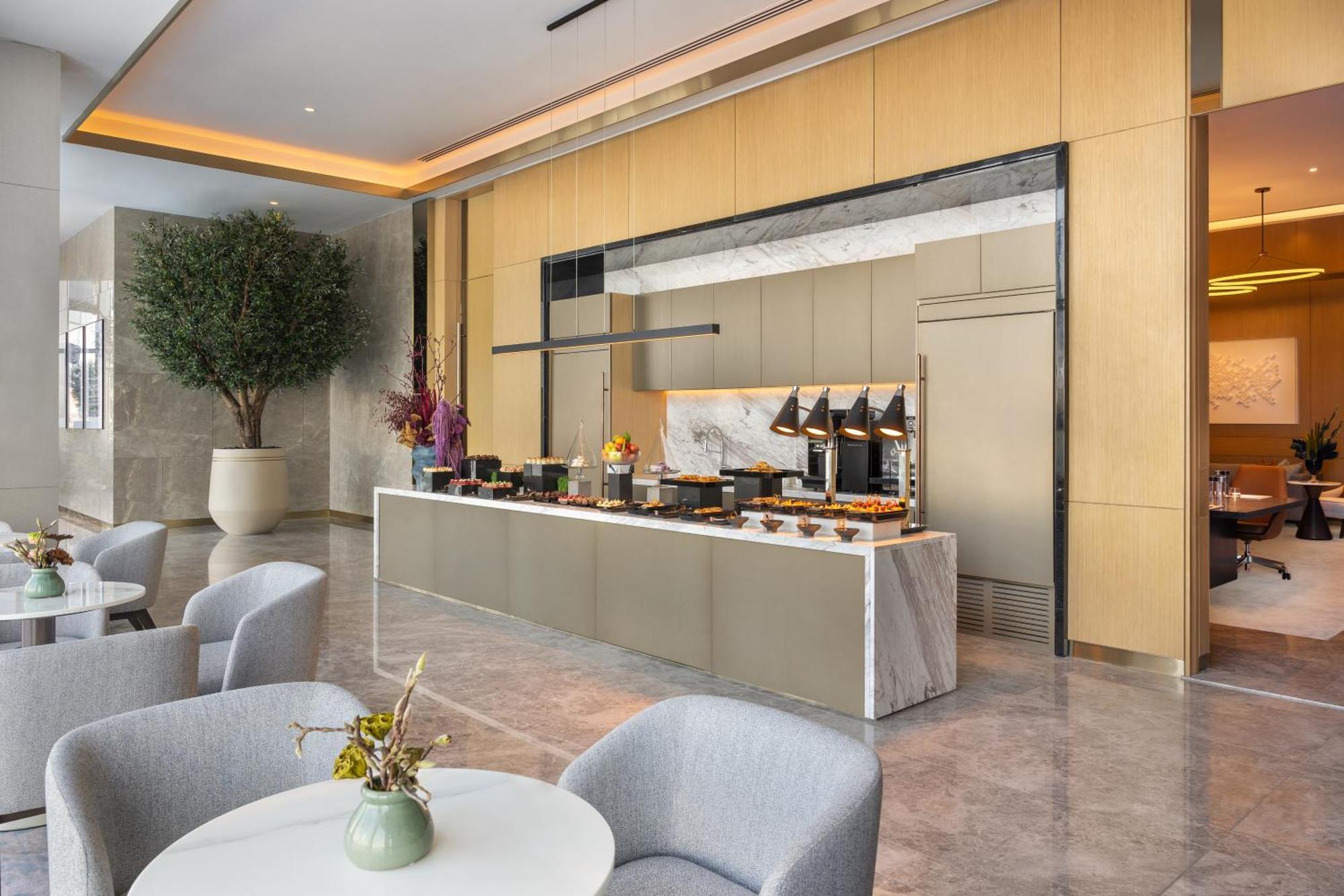 Hotel Address Creek Harbour Dubái Exterior foto The lounge at the airport